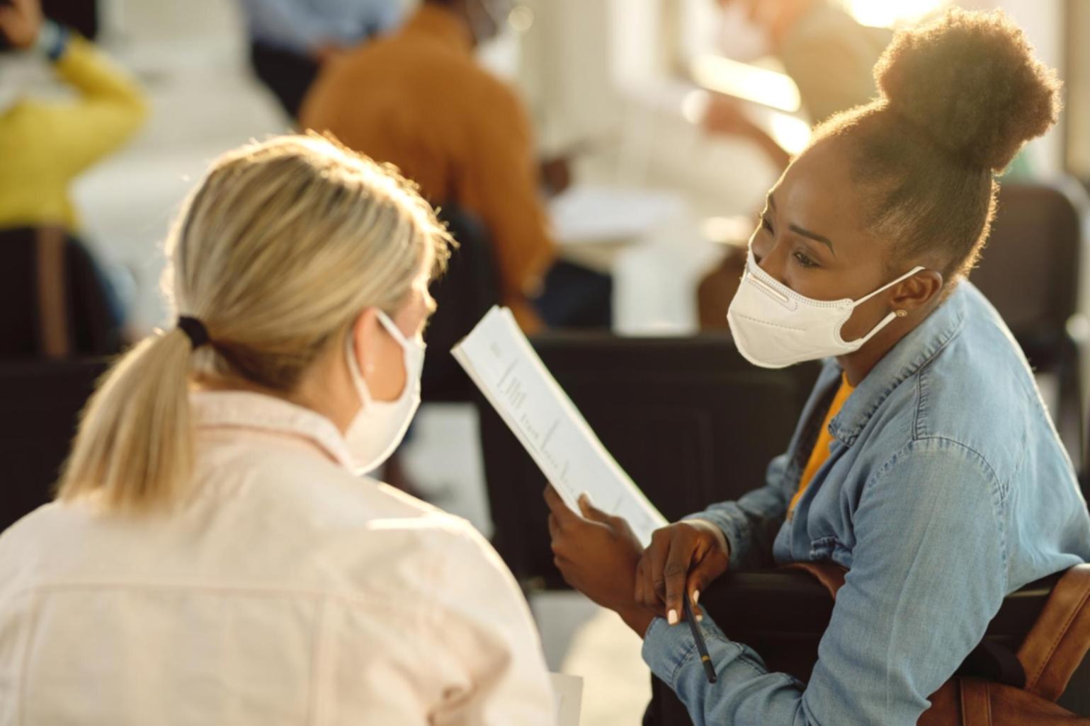 Modern office environment with financial analysis tools and collaborative workspace